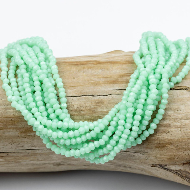 Cherry Tree Beads Crystal Beads - approx. 2x2.5mm Opaque Coastal Green Faceted Rondelles, 15 inch strand  Cherry Tree Beads Crystal Beads - approx. 2x2.5mm Opaque Coastal Green Faceted Rondelles, 15 inch strand