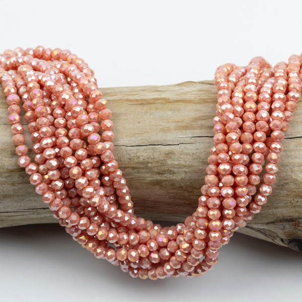Cherry Tree Beads Crystal Beads - approx. 2.5x3mm Opaque Peach Bellini Faceted Rondelles with AB finish, 15 inch strand  Cherry Tree Beads Crystal Beads - approx. 2.5x3mm Opaque Peach Bellini Faceted Rondelles with AB finish, 15 inch strand