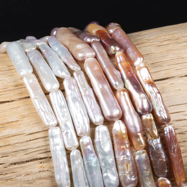 Beautiful pink and white Freshwater Pearl 5x23mm Biwa Stick Beads. Perfect for a craft night.