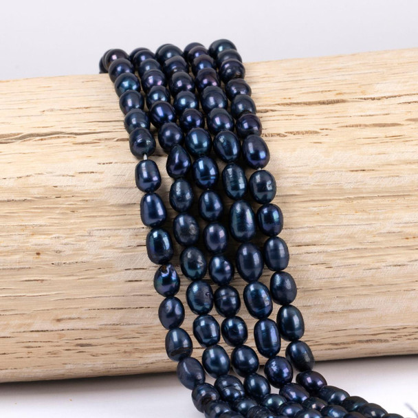 Cherry Tree Beads Freshwater Pearl 5x8mm Peacock Rice Beads - 8 inch strand 