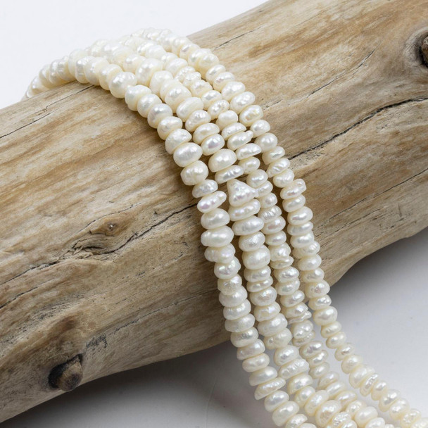 Cherry Tree Beads White Freshwater Pearl 2x4mm Irregular Rondelle Beads - 15 inch strand 