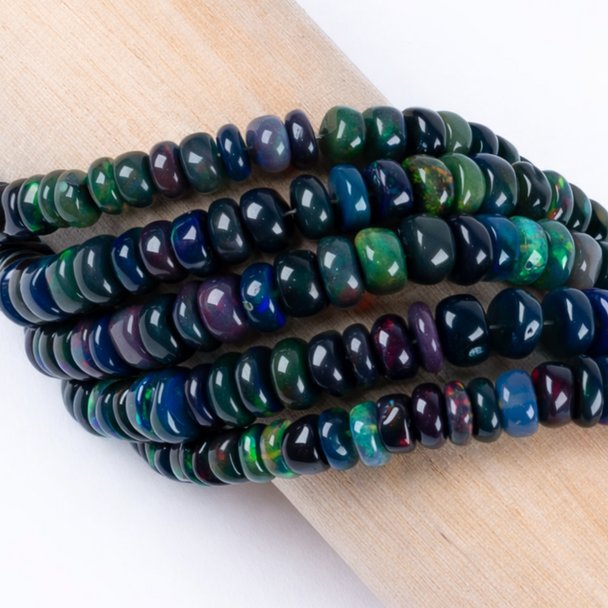 Cherry Tree Beads Black Opal 2x3-3x5mm Heishi - 16 inch strand