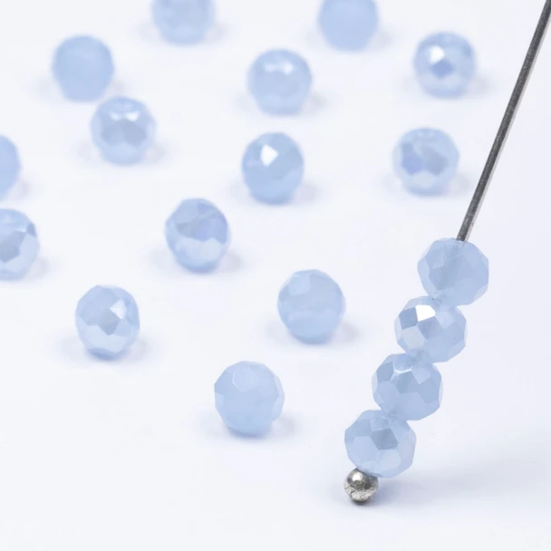 Pale blue beads for DIY projects.