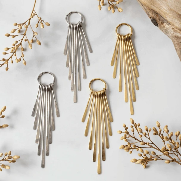 Stainless steel paddle component for bohemian designs.
