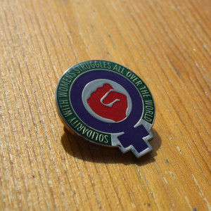 solidarity with women's struggles all over the world enamel badge solidarity with women's struggles all over the world enamel badge