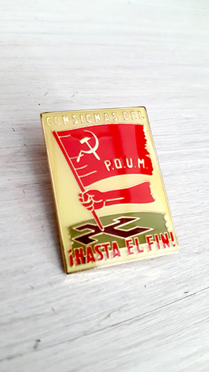 A quality enamel badge reproducing a POUM poster from the Spanish Civil War.

Original text on poster read 'Consignas del POUM. !Hasta El Fin!'
With image of arm stabbing a red POUM flag into a swastika.