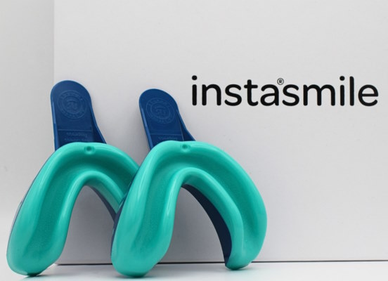 Woman using Instasmile impression kit