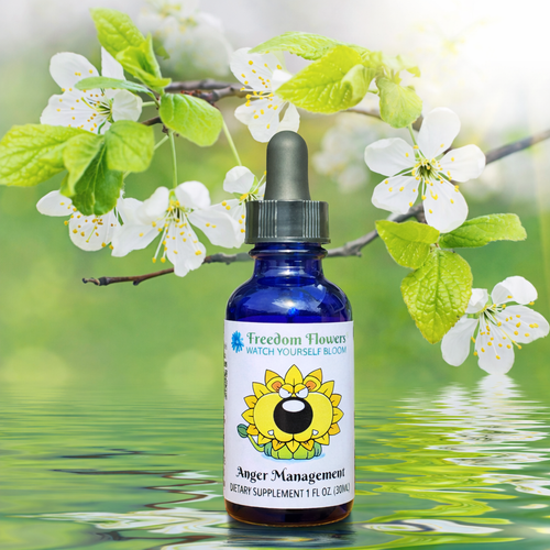 Anger Management flower essence bottle for held-in anger, set in front of flowers