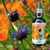 Chia flower essence bottle with flowers in background
