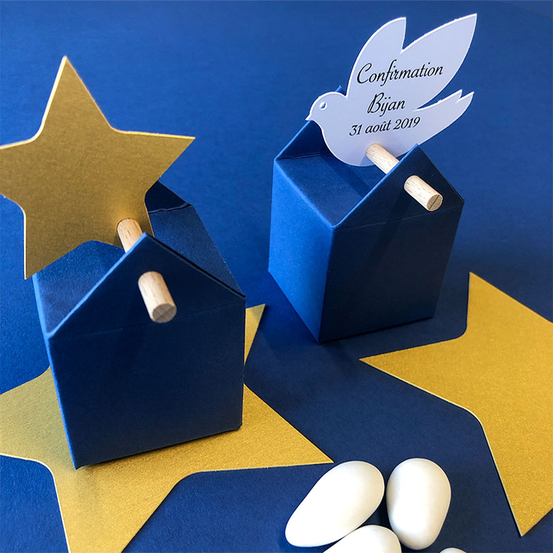 Boîtes à dragées dans une ambiance bleu et or