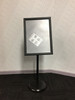 Adjustable metal poster stand with 360° rotatable snap frame