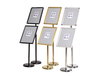 Adjustable metal poster stand with 360° rotatable snap frame