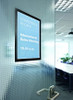 A1 black adhesive window poster holder in use