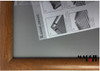 Close-up of the wood-grain finish on a 25mm snap frame profile