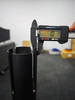 Premium black retractable belt queue barrier in use indoors
