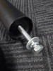 Premium black retractable belt queue barrier in use indoors
