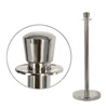 silver rope stanchion in use guiding a queue