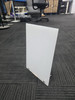 Clear acrylic sign holder standing on two metal legs, front view