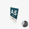A5 clear acrylic sign holder with metal legs, holding a poster