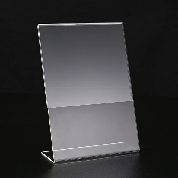 A3 portrait slant back acrylic sign stand used as a menu holder on a counter