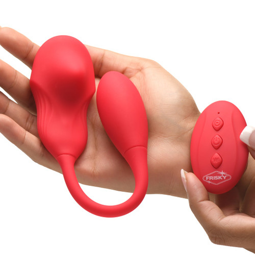Double Love Connection Silicone Panty Vibe With Remote Control in hand