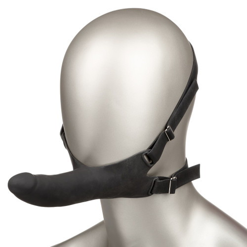 Accommodator Silicone Dong – Black strapped to mannequin head Accommodator Silicone Dong – Black strapped to mannequin head