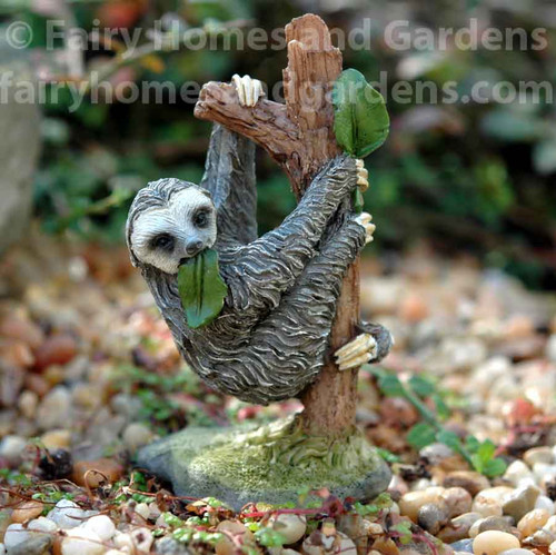 Miniature Sloth Eating Leaves