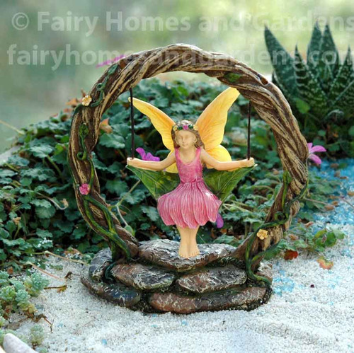 Woodland Knoll Fairy on a Leaf Swing