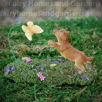 Puppy Playing with Butterfly Figurine