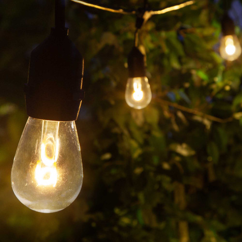 WGC-84122 - 45' Warm White LED FlexFilament Commercial Shatterproof Patio String Light Set with 15 S14 Bulbs, Black Wire, 36" Spacing, with Drops - Wintergreen Corporation