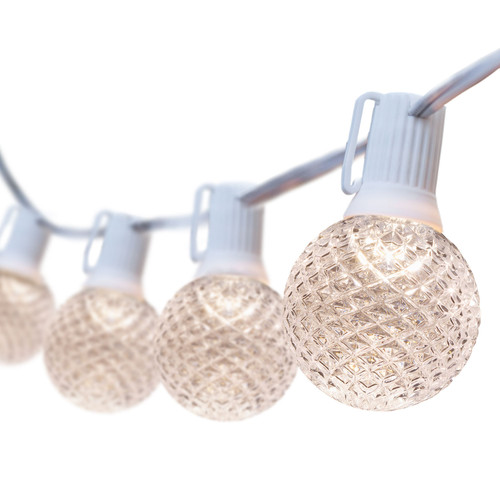 WGC-79452 - 100' Warm White LED OptiCore Commercial Patio String Light Set with 100 G50 Bulbs, E12 Base, White Wire, 12" Spacing - Wintergreen Corporation