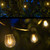 WGC-84118 - 30' Warm White LED FlexFilament Commercial Shatterproof Patio String Light Set with 10 S14 Bulbs, Black Wire, 36" Spacing - Wintergreen Corporation