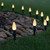 WGC-84806 - C9 Warm White LED Commercial Smooth Christmas Pathway Lights, 5" Stakes, 25 Lights, 25', Green Wire, 12" Spacing - Wintergreen Corporation