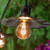 Wintergreen Corporation 79572 35' FlexFilament Antiqued LED Patio String Light Set with 7 A19 Edison Bulbs on Black Wire