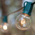 WGC-69454 - 50' Clear Incandescent Commercial Patio String Light Set with 50 G40 Bulbs, Green Wire, 12" Spacing - Wintergreen Corporation