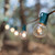 WGC-69454 - 50' Clear Incandescent Commercial Patio String Light Set with 50 G40 Bulbs, Green Wire, 12" Spacing - Wintergreen Corporation