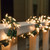 WGC-17905 - 9' Clear Incandescent Garland Lights, 300 Lamps, Green Wire - Wintergreen Corporation