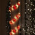 WGC-79084 - 18' Mini Red/Clear Incandescent Garland Lights, 600 Lights, White Wire - Wintergreen Corporation