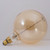 60W GLOBE SHAPED GRAND NOSTALGIC SPIRAL E26 120V | Bulbrite | 137401 | NOS60-GLOBE