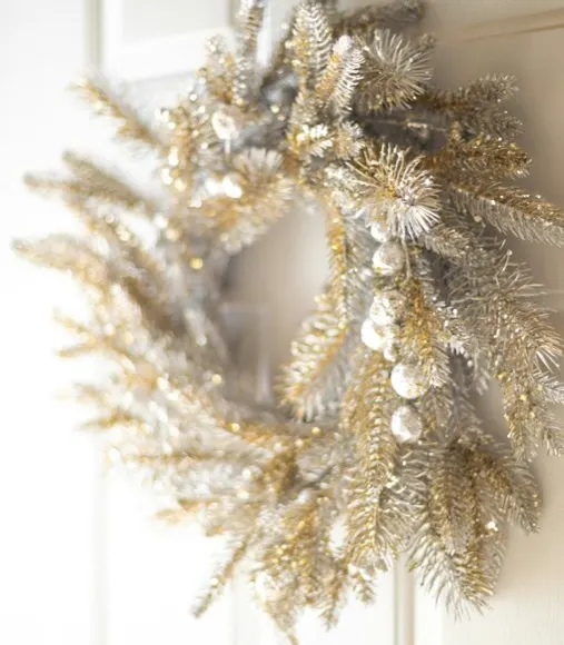 Frosted Christmas wreath with baubles