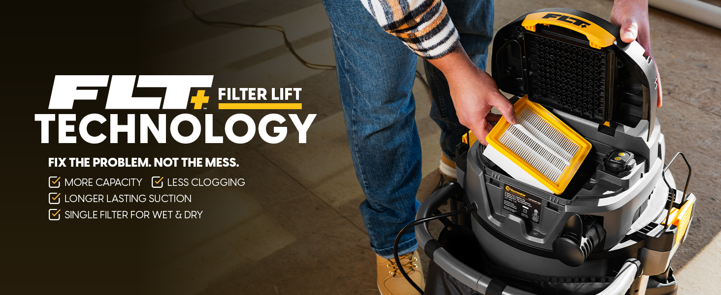 A person removes a flat filter from the vacuum