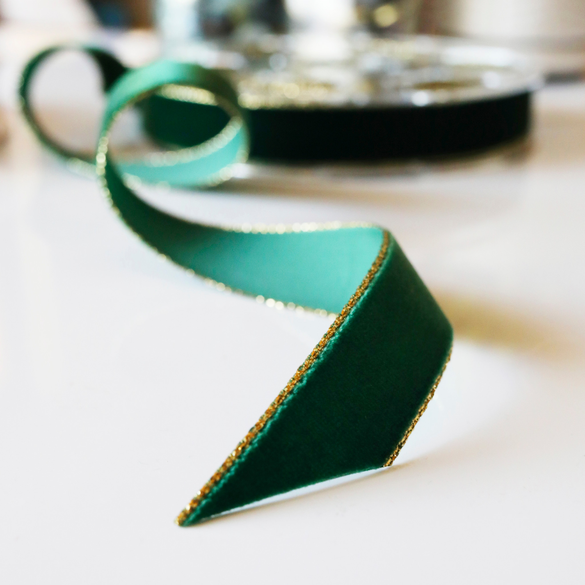 1/8 gold edge emerald green satin ribbon 5 knotted loop