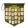 Junior Ranger adventure keepsake display banner in rustic travel-themed room