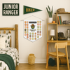 National Parks Explorer junior ranger banner with pixel-style ranger hat badge and achievement-inspired wall display