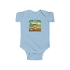 Baby wearing Junior Ranger bodysuit with camping design