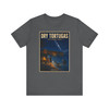 Asphalt Dry Tortugas National Park Florida shark T-shirt featuring vintage-inspired MOMENT No. 003 artwork with a nighttime fisherman, shark, Fort Jefferson and starry sky.