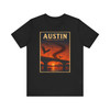 Black Austin Texas Congress Avenue Bridge bat T-shirt featuring vintage-inspired MOMENT No. 007 artwork with bats emerging beneath the bridge at sunset.