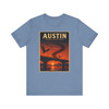 Austin Texas Congress Avenue Bridge bat T-shirt featuring vintage-inspired MOMENT No. 007 artwork with bats emerging beneath the bridge at sunset.