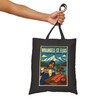 Black cotton canvas Wrangell-St. Elias Alaska tote bag featuring MOMENT No. 001 salmon and fish wheel artwork.