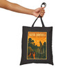 Black cotton canvas Louisiana Bayou tote bag featuring MOMENT No. 002 alligator artwork.